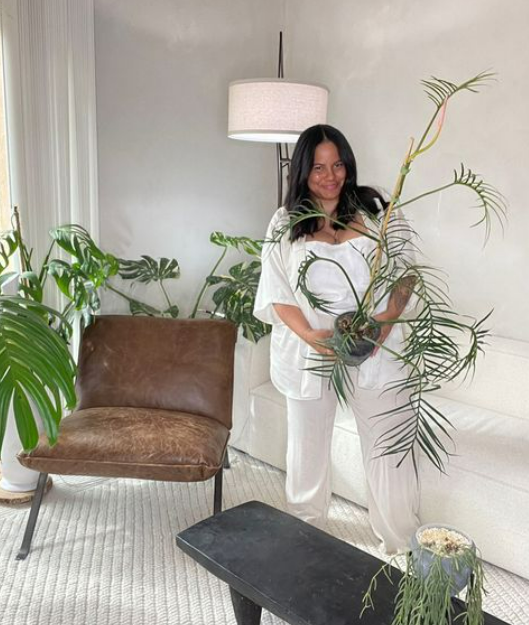 Denise Brown at home with her plants